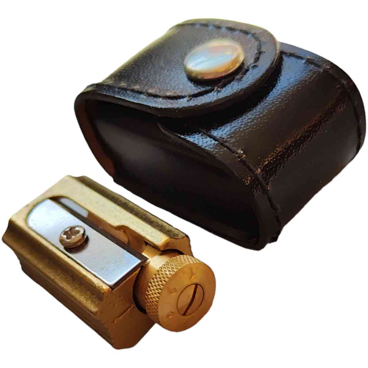 Pencil and crayon sharpener made of brass